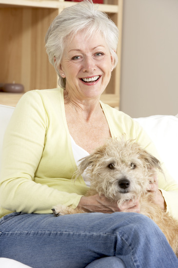 Older Woman with Dog on Lap